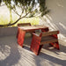 Gewerbefabrik Tisch Erlstedt Holz Outdoor Stadtmobiliar Rot RAL 3001 Szene