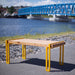 Gewerbefabrik Tisch Herrstein Holz Outdoor Stadtmobiliar Gelb RAL 1028 Szene