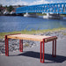 Gewerbefabrik Tisch Herrstein Holz Outdoor Stadtmobiliar Rot RAL 3001 Szene
