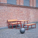 Gewerbefabrik Tisch Kirsbach Holz Outdoor Stadtmobiliar Rot RAL 3001 Hof