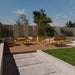 Gewerbefabrik Tisch Roderath Holz Outdoor Stadtmobiliar Gelb RAL 1028 Szene
