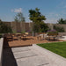 Gewerbefabrik Tisch Roderath Holz Outdoor Stadtmobiliar Grau RAL 7011 Szene