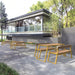 Gewerbefabrik Tisch Rottorf Holz Outdoor Stadtmobiliar Gelb RAL 1028 Szene