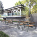 Gewerbefabrik Tisch Rottorf Holz Outdoor Stadtmobiliar Grau RAL 7011 Szene